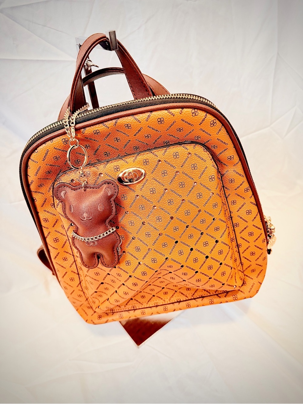 Women's Tan Patterned Mini Backpack with Bear Charm